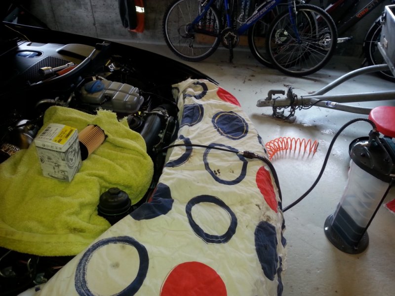 Brukt olje suges ut.jpg